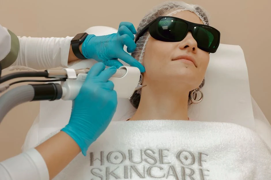 Patient wearing protective eyewear during a facial laser treatment